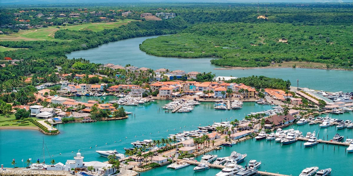 Casa de Campo in the Dominican Republic, with turquoise water, luxury waterfront villas, private marina, and lush scenery.