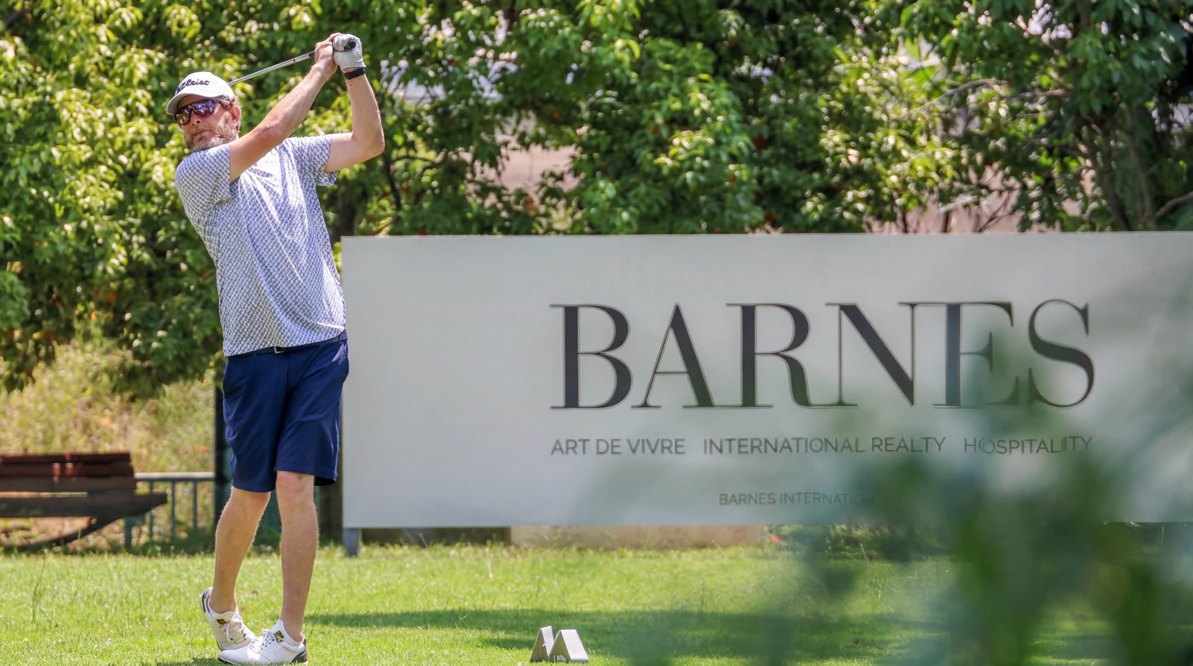 Casa de Campo golf setting with a BARNES sign in the foreground
