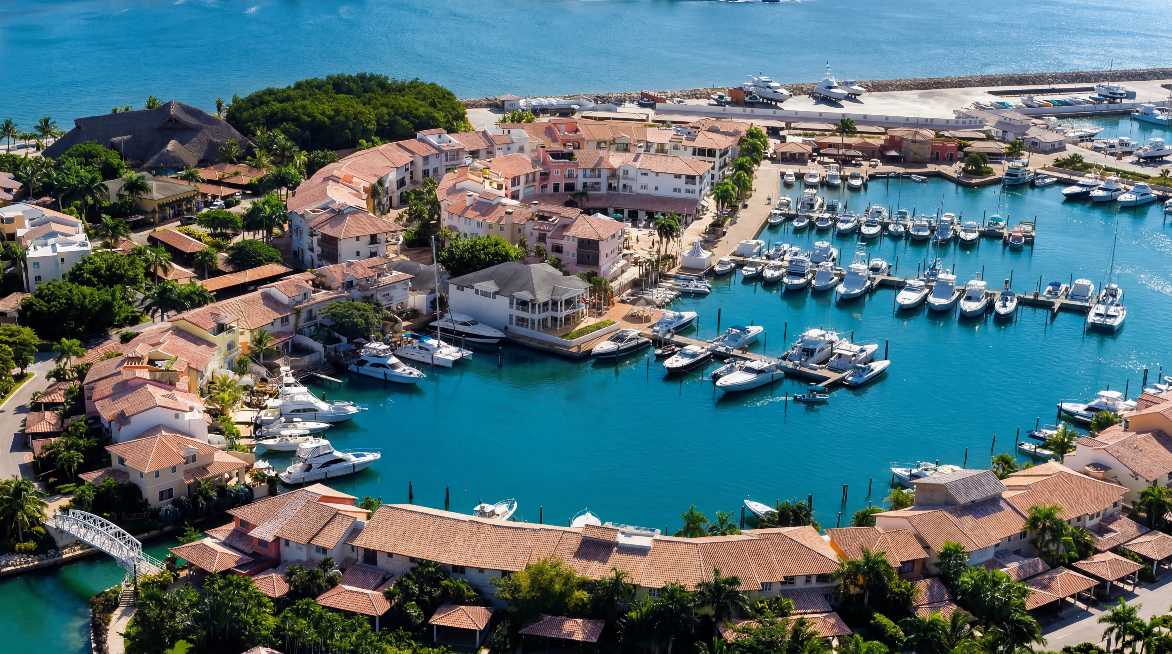 Casa de Campo Marina with yachts, pastel buildings, and waterfront residences