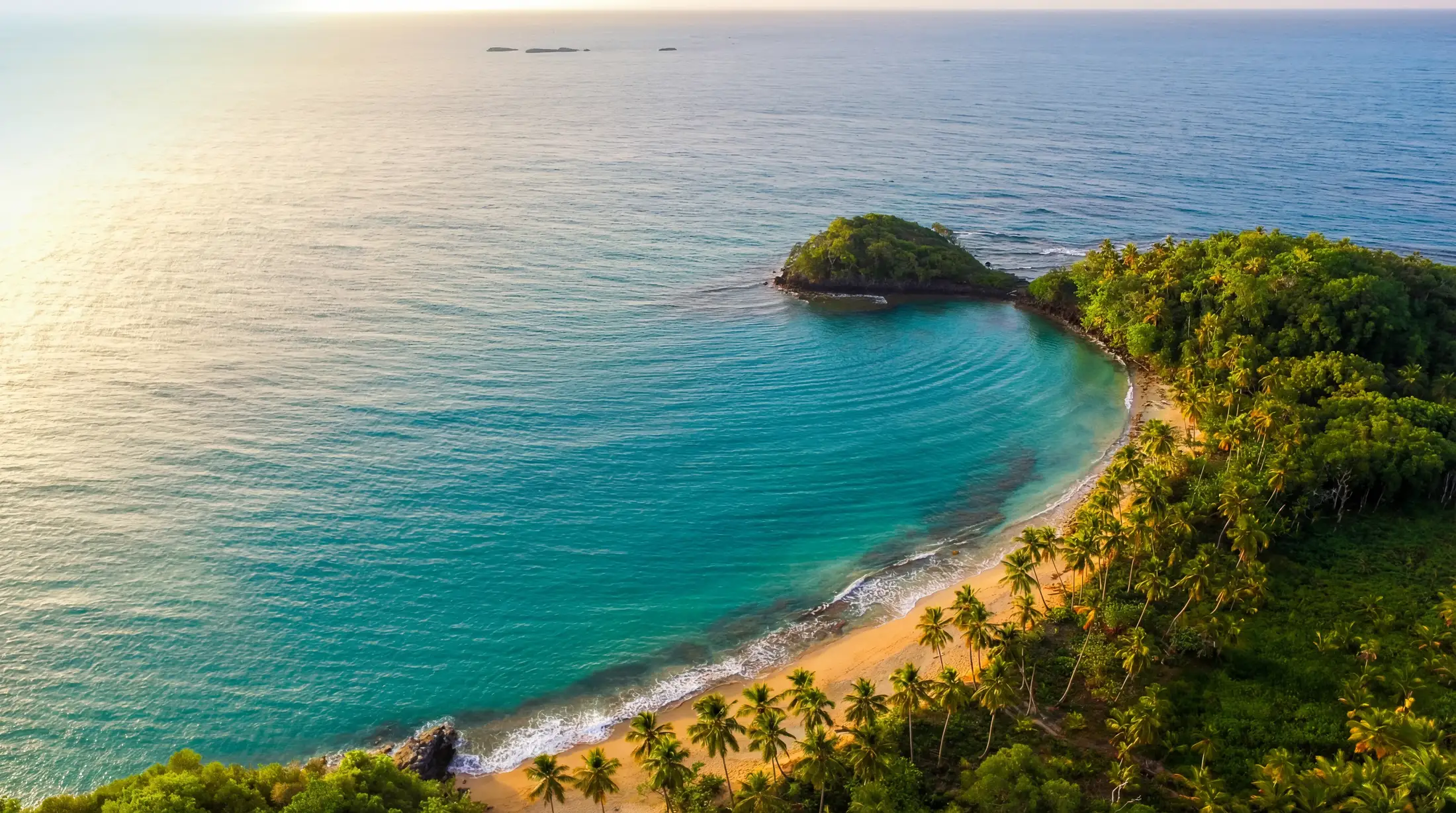 Playa Escondida in Las Terrenas with turquoise water and lush green coastline