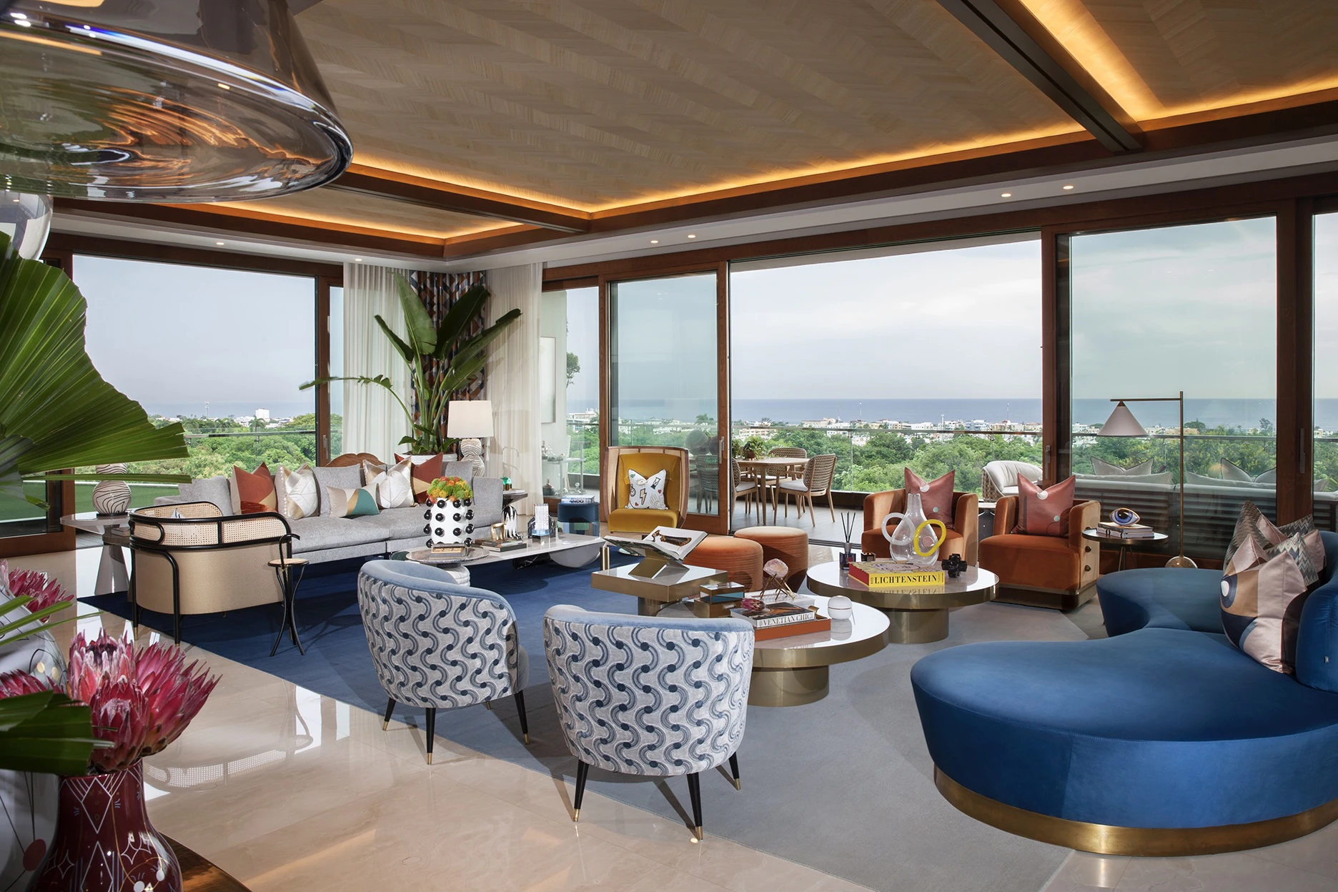 Elegant Santo Domingo living room with an ocean-view terrace and warm wood detailing